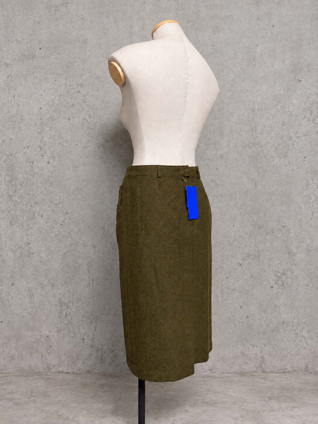 Jupe vintage mi-longue kaki olive laine – taille haute, coupe droite ajustée, poches latérales
